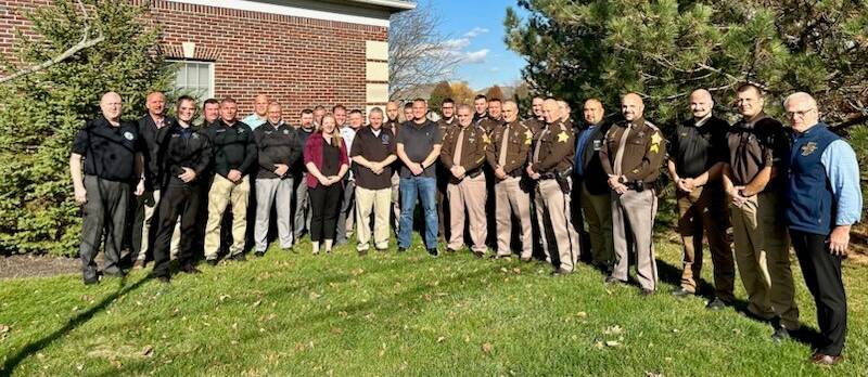 Outdoor group photo of officers.